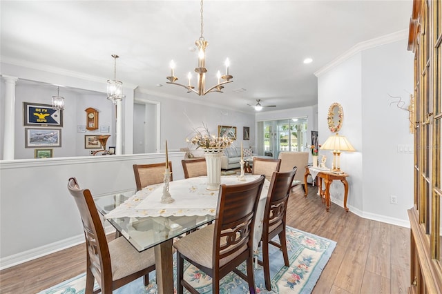 dining area with recessed lighting, light wood-type flooring, baseboards, and ornamental molding