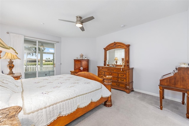 bedroom featuring carpet floors, a ceiling fan, baseboards, and access to outside