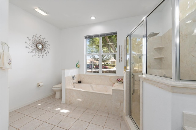 bathroom featuring a stall shower, a bath, toilet, tile patterned flooring, and visible vents