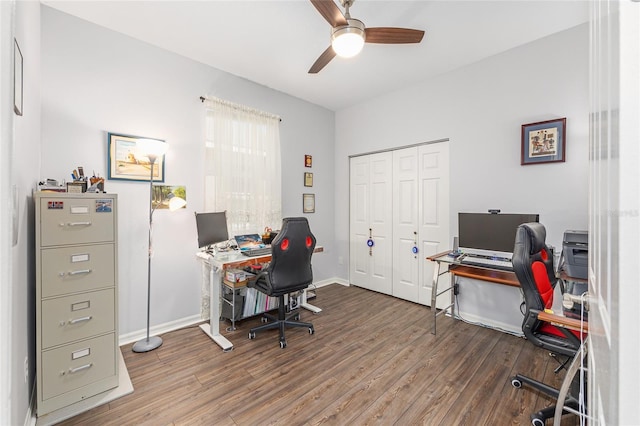 home office with ceiling fan, baseboards, and wood finished floors