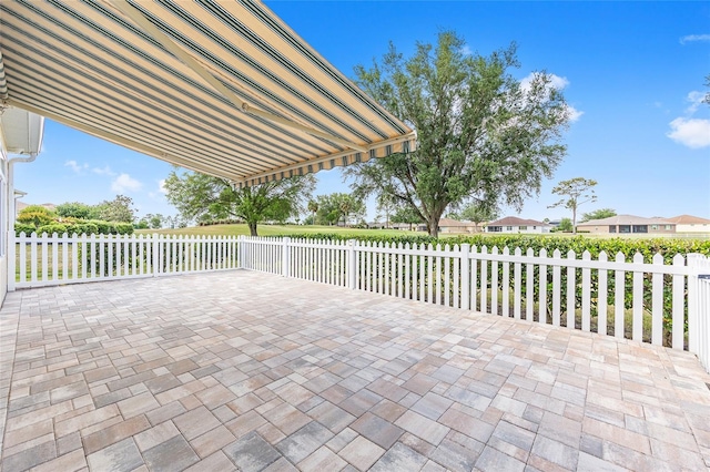 view of patio with fence