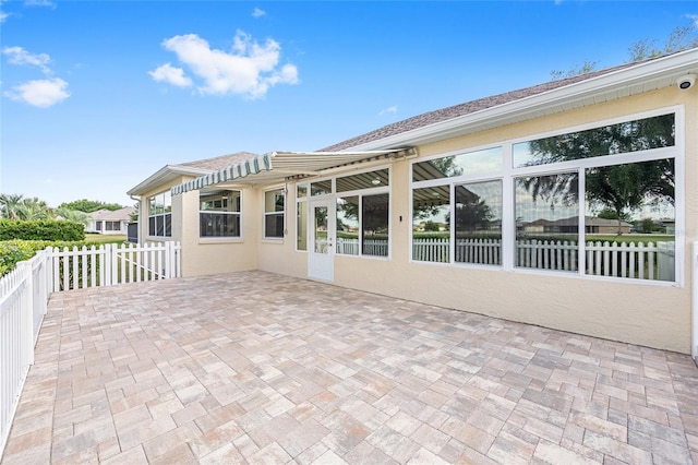 view of patio / terrace featuring fence