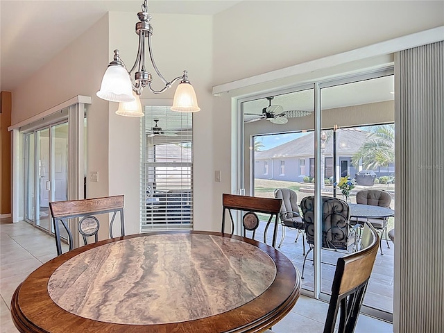 dining space with plenty of natural light, ceiling fan, and light tile patterned flooring