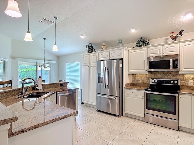 kitchen with visible vents, a sink, white cabinetry, and appliances with stainless steel finishes