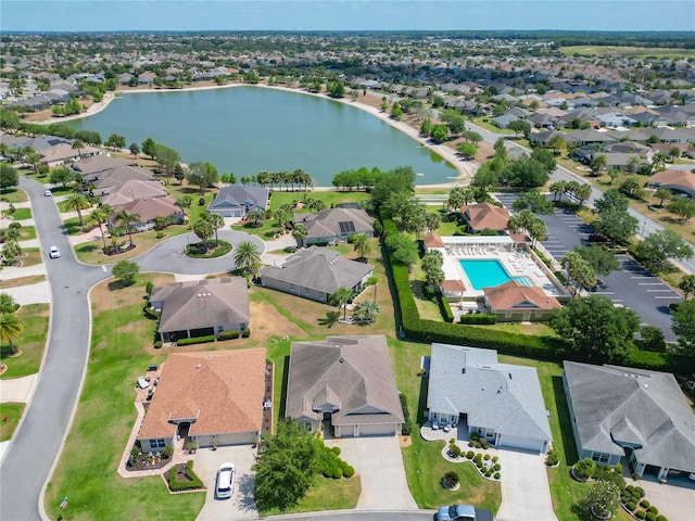 aerial view featuring a water view and a residential view