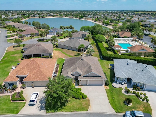 aerial view featuring a water view and a residential view
