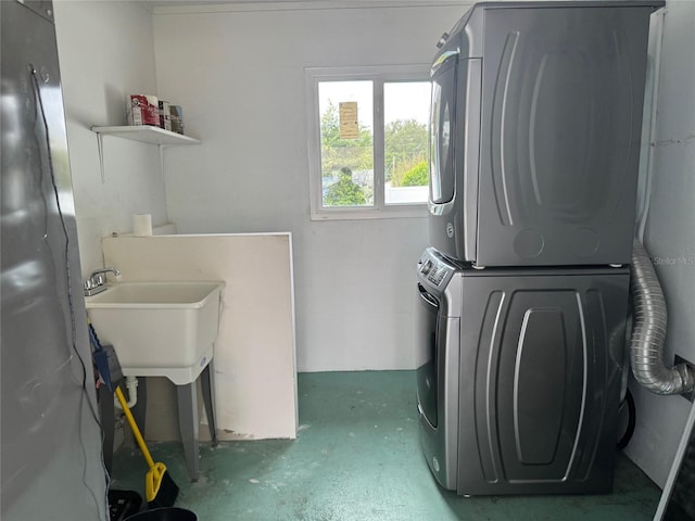 21570 SW Raintree St, Dunnellon, FL 34431 - washroom featuring stacked washer and clothes dryer and laundry area