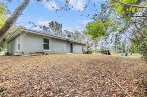 42 Dogwood Drive Crse, Ocala, FL 34472 - back of property with stucco siding