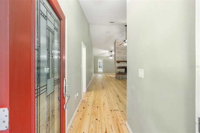 8 Banyan Dr, Ocala, FL 34472 - hallway featuring light wood-style floors and baseboards