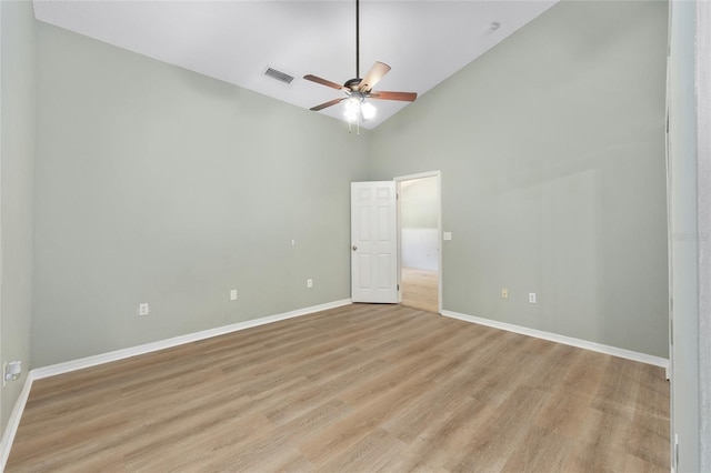 8 Banyan Dr, Ocala, FL 34472 - unfurnished room with a ceiling fan, visible vents, high vaulted ceiling, baseboards, and light wood finished floors