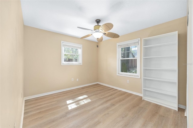 8 Banyan Dr, Ocala, FL 34472 - empty room featuring a ceiling fan, baseboards, and light wood-type flooring