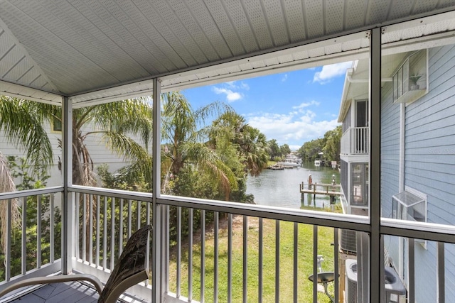 255 NW Bay Path Dr, Crystal River, FL 34428 - balcony featuring a water view and central AC unit