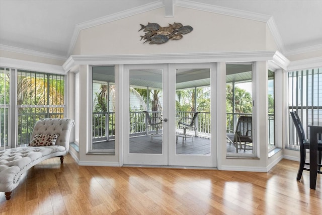 255 NW Bay Path Dr, Crystal River, FL 34428 - doorway to outside featuring vaulted ceiling, a healthy amount of sunlight, and hardwood / wood-style flooring