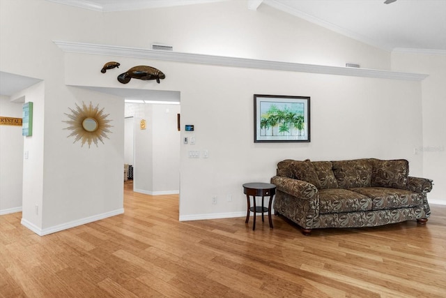 255 NW Bay Path Dr, Crystal River, FL 34428 - sitting room with baseboards, wood finished floors, lofted ceiling, visible vents, and ornamental molding