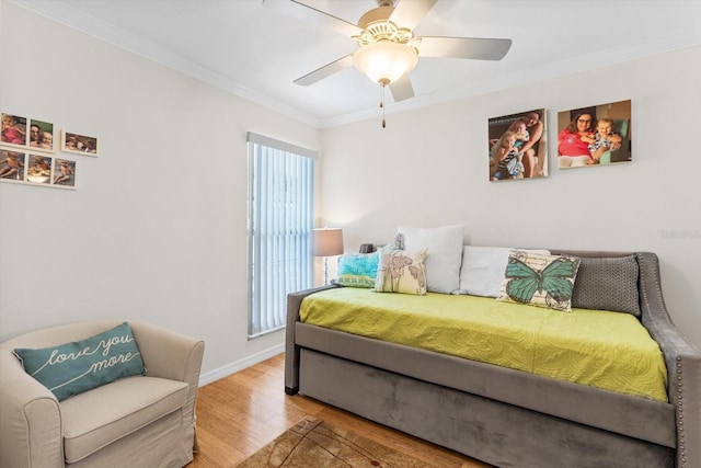 255 NW Bay Path Dr, Crystal River, FL 34428 - bedroom featuring crown molding, baseboards, wood finished floors, and multiple windows