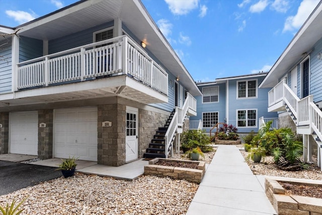 255 NW Bay Path Dr, Crystal River, FL 34428 - exterior space featuring stairs and a garage
