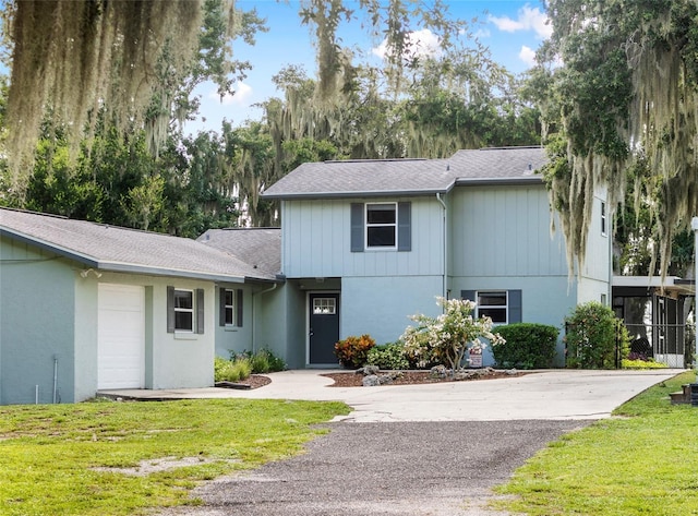 4237 Chambers St, Lake Wales, FL 33898 - traditional-style home with a front lawn, driveway, and a shingled roof