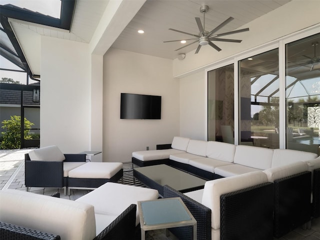 view of patio with ceiling fan and outdoor lounge area