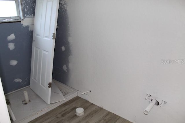 9455 SW 31st Ct, Ocala, FL 34476 - bathroom featuring wood finished floors