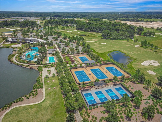 aerial view featuring golf course view and a water view