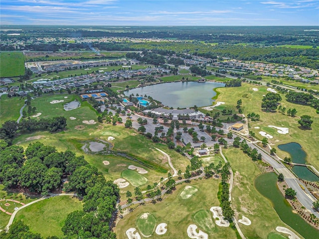 birds eye view of property featuring a water view and view of golf course
