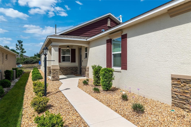 9923 SW 98th Ln, Ocala, FL 34481 - doorway to property with stucco siding and stone siding