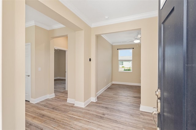 9923 SW 98th Ln, Ocala, FL 34481 - foyer entrance featuring baseboards, ornamental molding, a ceiling fan, and light wood-style flooring
