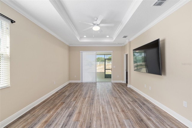 9923 SW 98th Ln, Ocala, FL 34481 - spare room with a raised ceiling, a ceiling fan, visible vents, and wood finished floors
