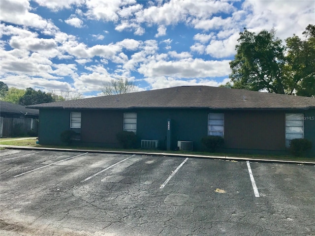 5440 SE 30th Pl, Ocala, FL 34480 - exterior space featuring uncovered parking and central AC unit