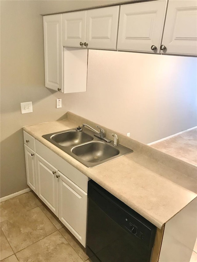 5440 SE 30th Pl, Ocala, FL 34480 - kitchen with a sink, dishwasher, and white cabinets