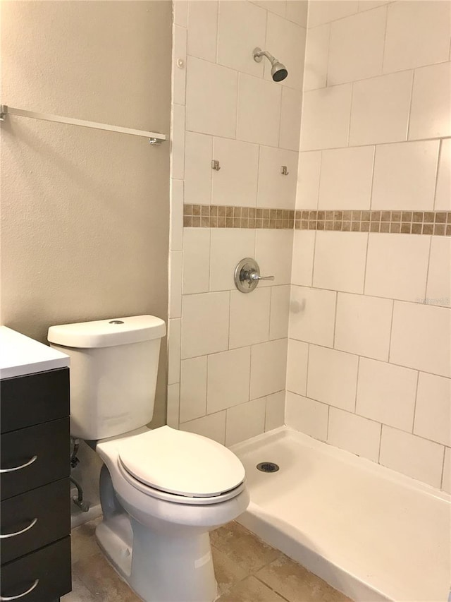 5440 SE 30th Pl, Ocala, FL 34480 - full bathroom featuring tile patterned flooring, vanity, toilet, and a shower stall