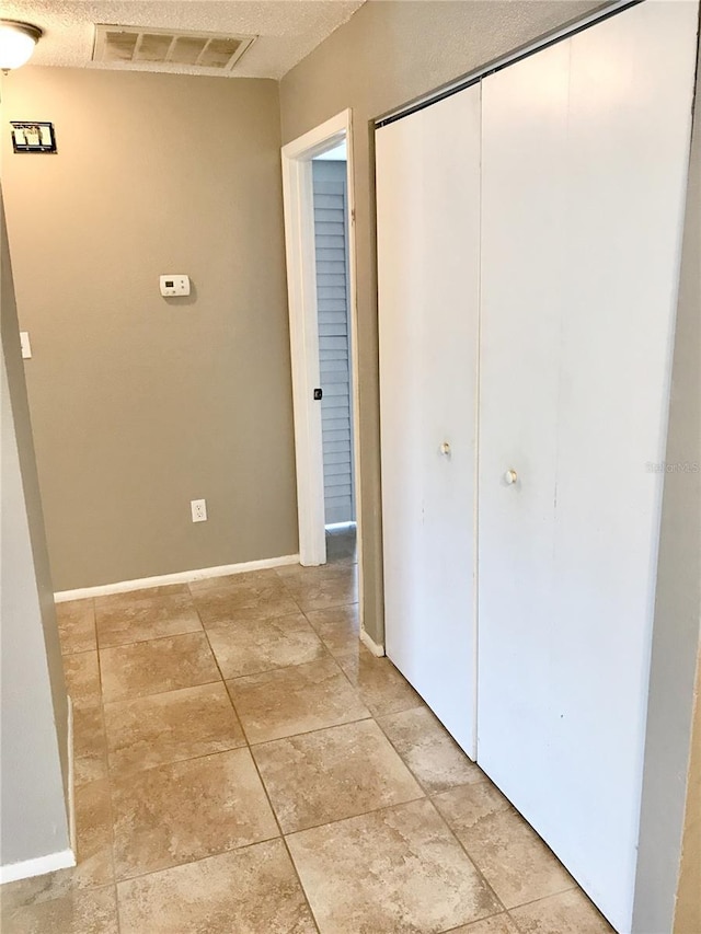 5440 SE 30th Pl, Ocala, FL 34480 - corridor featuring baseboards and visible vents