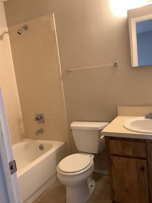 5440 SE 30th Pl, Ocala, FL 34480 - full bathroom with toilet, tile patterned floors,  shower combination, and vanity