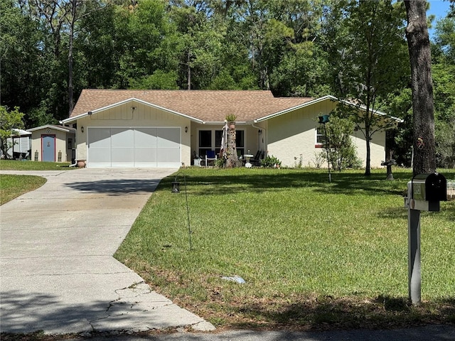 8951 SW 202nd Avenue Rd, Dunnellon, FL 34431 - single story home with a garage, driveway, and a front lawn