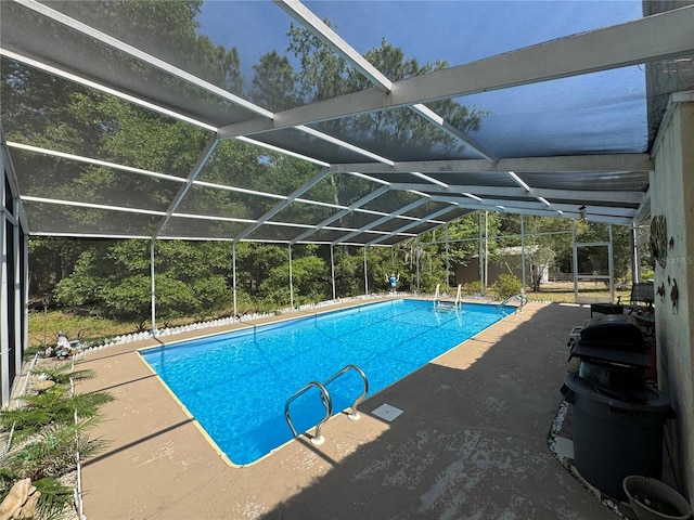 8951 SW 202nd Avenue Rd, Dunnellon, FL 34431 - outdoor pool with a patio area and glass enclosure