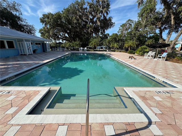8951 SW 202nd Avenue Rd, Dunnellon, FL 34431 - community pool featuring a patio area