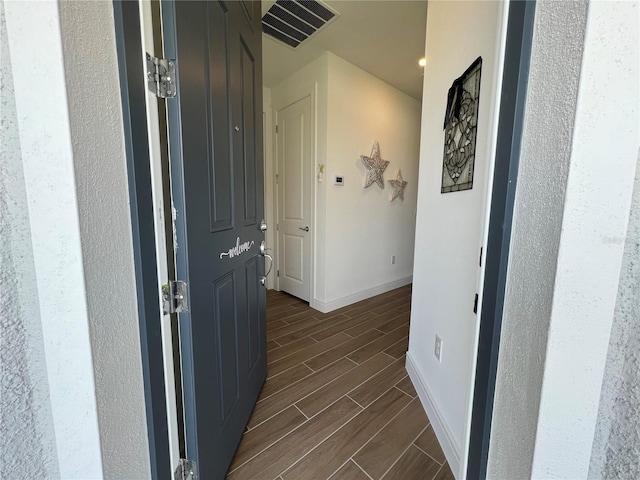5785 SW 87th Court Rd, Ocala, FL 34481 - hallway with wood tiled floors and baseboards