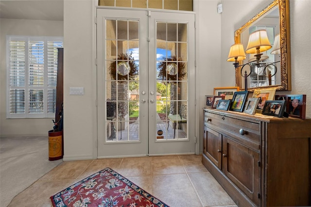 811 SE 49th Ave, Ocala, FL 34471 - entryway featuring light tile patterned floors and french doors