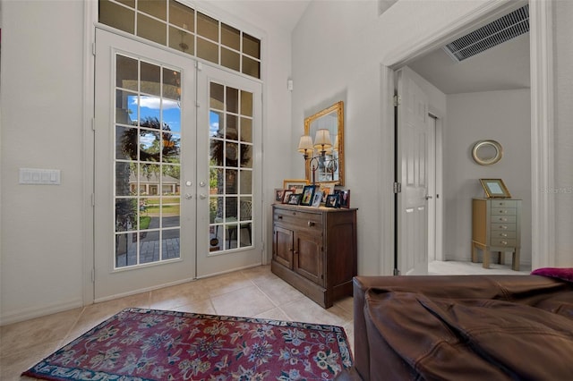 811 SE 49th Ave, Ocala, FL 34471 - entryway featuring light tile patterned floors, visible vents, and french doors