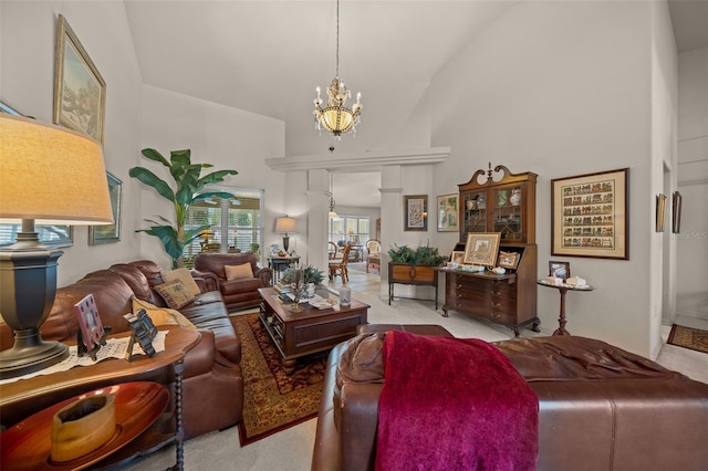 811 SE 49th Ave, Ocala, FL 34471 - living room featuring carpet flooring, a notable chandelier, and high vaulted ceiling