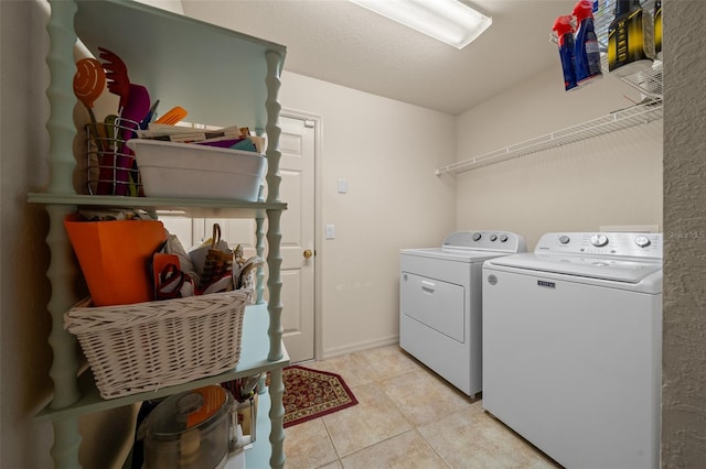811 SE 49th Ave, Ocala, FL 34471 - laundry area with washer and dryer, laundry area, and light tile patterned floors