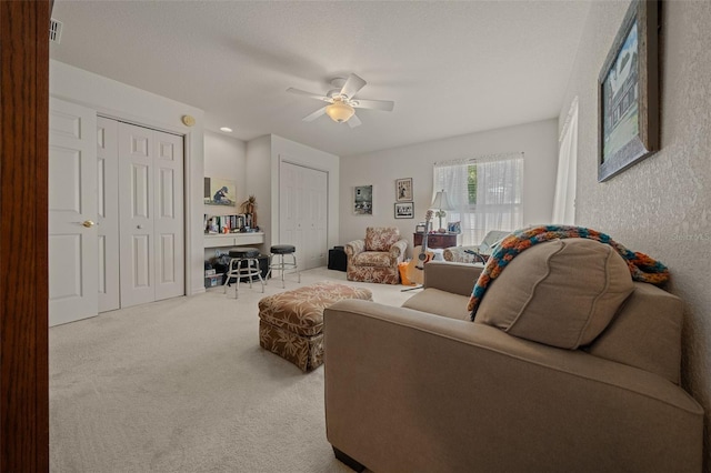 811 SE 49th Ave, Ocala, FL 34471 - living room with a ceiling fan and carpet