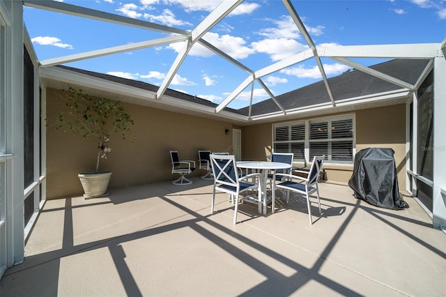 811 SE 49th Ave, Ocala, FL 34471 - view of patio / terrace featuring a lanai and outdoor dining area