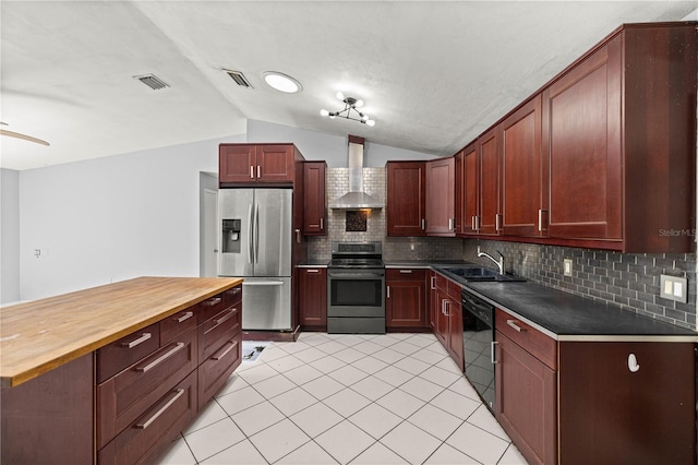 14171 SW 8th Ave, Ocala, FL 34473 - kitchen with stainless steel appliances, wall chimney range hood, vaulted ceiling, wood counters, and backsplash