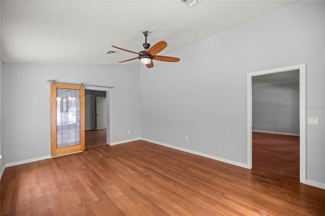 14171 SW 8th Ave, Ocala, FL 34473 - spare room featuring wood finished floors, a ceiling fan, and lofted ceiling