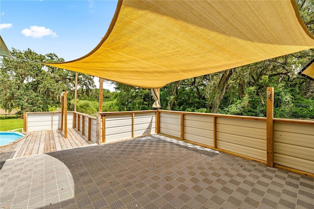 14171 SW 8th Ave, Ocala, FL 34473 - view of patio with a wooden deck and view of scattered trees