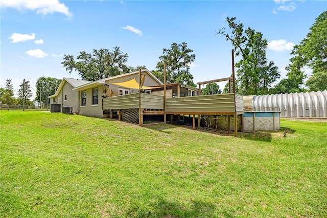 14171 SW 8th Ave, Ocala, FL 34473 - rear view of property with a deck