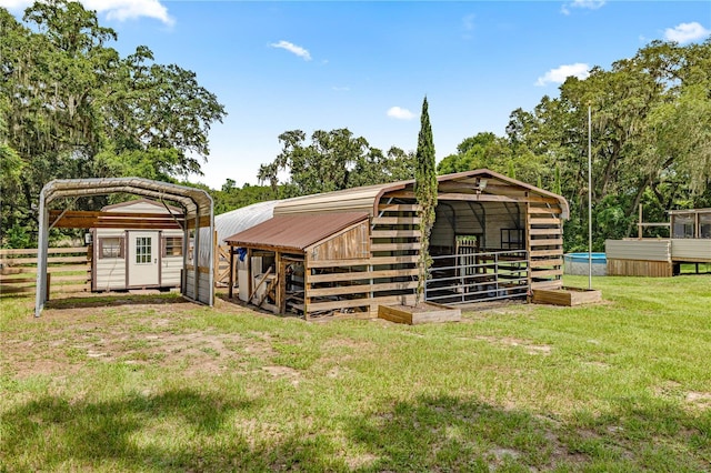 14171 SW 8th Ave, Ocala, FL 34473 - view of outbuilding with a detached carport and an exterior structure