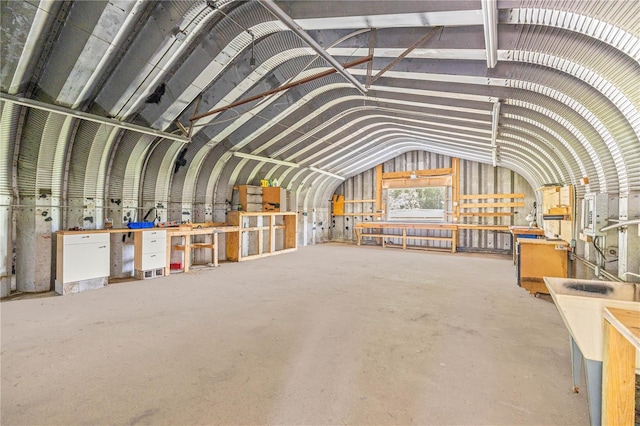 14171 SW 8th Ave, Ocala, FL 34473 - misc room featuring lofted ceiling, a workshop area, and concrete floors