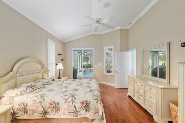 bedroom featuring ornamental molding, access to exterior, multiple windows, and light wood-type flooring